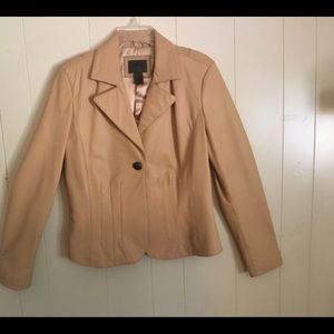 A John Paul Richard leather jacket. Color Beige , Size M in good condition.